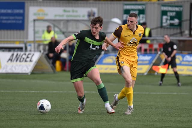 Rob Harker of Hartlepool United is challenged by Ben Goodliffe of Sutton United during the Vanarama National League match between Sutton United  and Hartlepool United at the Knights Community Stadium, Gander Green Lane,, Sutton on Saturday 14th March 2020. (Credit: Paul Paxford | MI News) SUTTON, ENGLAND - MARCH 14TH