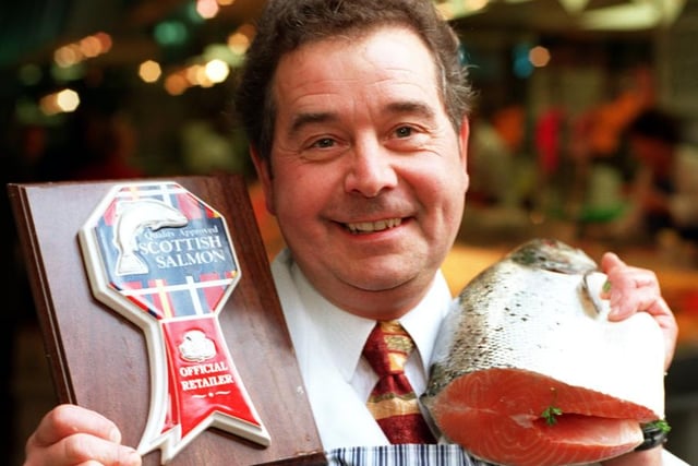 Bernard Taylor celebrates becoming an official retailer of Tatan Quality Scottish Salmon at his stall in Doncaster fish market in 1997