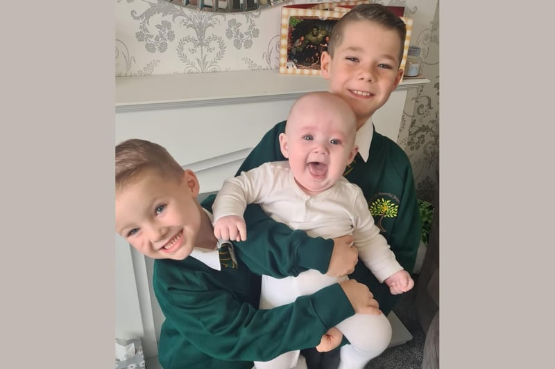 Jake, going into Year 2, and Thomas, going into Year 5 with their baby brother George.