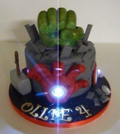 This brilliant 3D cake features Hulk's hand bursting out of the cake.
