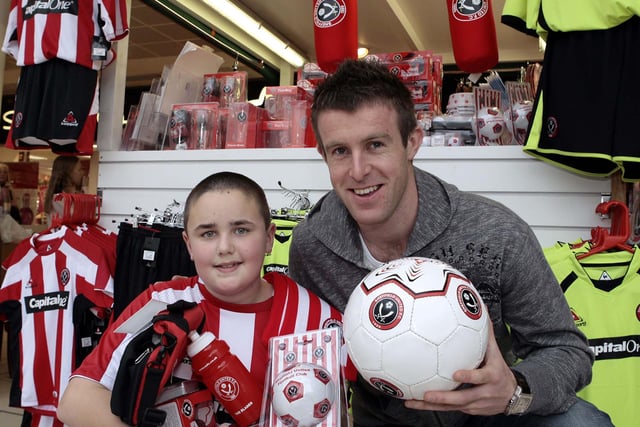 Kieran Smith, of Delves Place, Hackenthorpe, meets Sheffield United midfielder Michael Tonge at Crystal Peaks shopping centre in March 2008