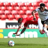 BAMichael Sollbauer of Barnsley battles for possession with Chiedozie Ogbene of Rotherham United. (Photo by Jan Kruger/Getty Images)