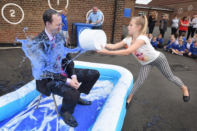 Deputy Head at Simondside Primary School, Edward Jackson, was pictured on his last day before he left and Year 6 pupil, Ella Callaghan got to gunge him. Remember this?