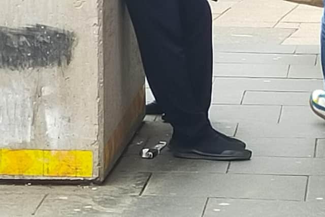 The knife is pictured here lying in the street near to one of Fargate's large concrete blocks.