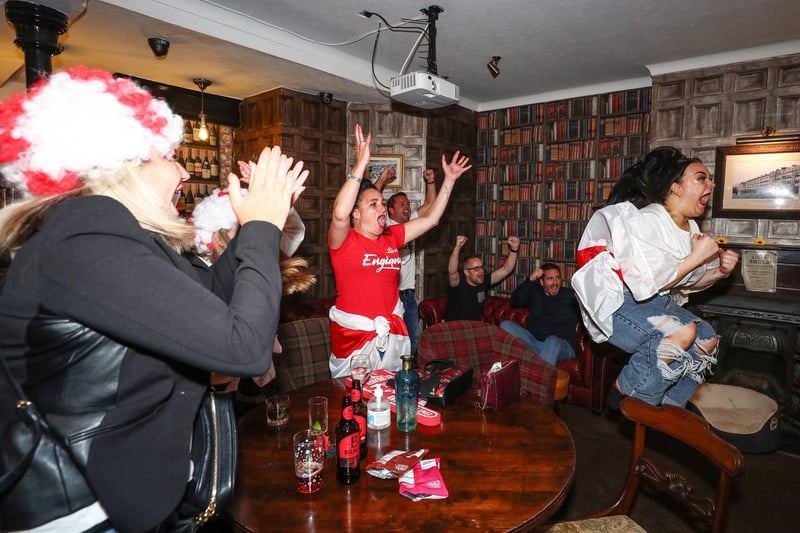 Fans pictured in The Kings pub celebrating as England score their second goal. Picture: Stuart Martin (220421-7042)