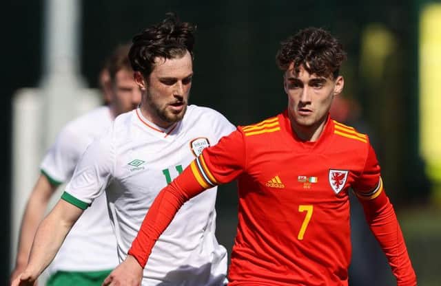 Niall Huggins playing for Wales Under-23s.