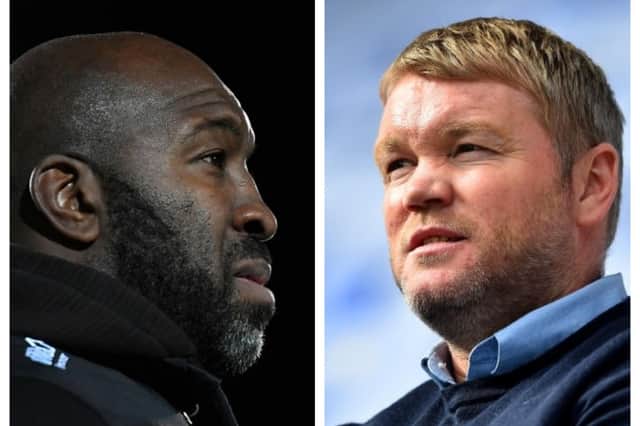 Doncaster Rovers' Darren Moore and Hull City's Grant McCann.