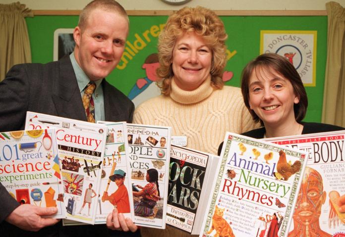 Liz Atkinson, a teacher at Doncaster children's hospital holding books that have been donated. Taken in 1997.