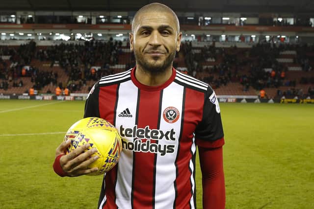 Leon Clarke with the matchball after his four-goal haul against Hull: Simon Bellis/Sportimage