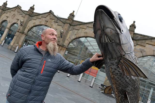 Sculpture unveiled to celebrate return of salmon to city's rivers outside Sheffield train station. Artist Jason Heppenstall.