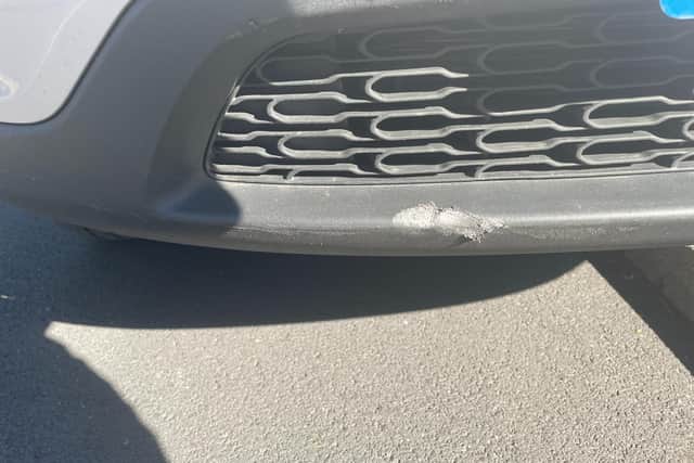Damage found at the front of the car. Mrs Newton says this damage was not on the car before she left Wales.