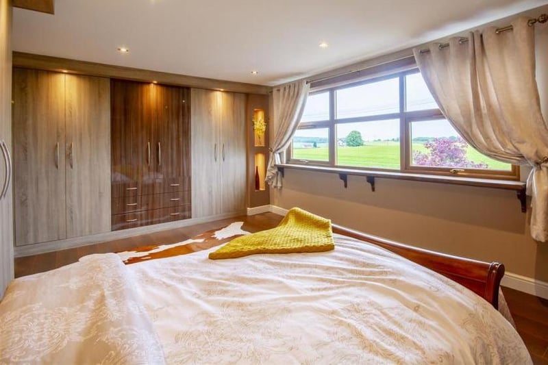 Another view of the master bedroom. Look at those huge wardrobes!