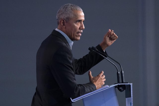 Former US president Barack Obama delivers a speech to delegates during the Cop26 summit at the Scottish Event Campus (SEC) in Glasgow. Picture date: Monday November 8, 2021.