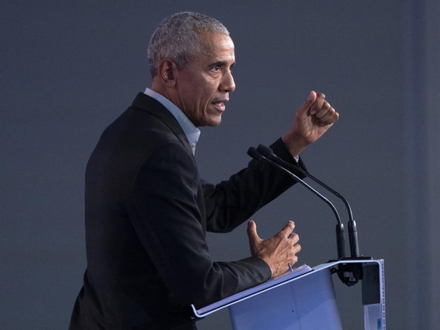 Former US president Barack Obama delivers a speech to delegates during the Cop26 summit at the Scottish Event Campus (SEC) in Glasgow. Picture date: Monday November 8, 2021.