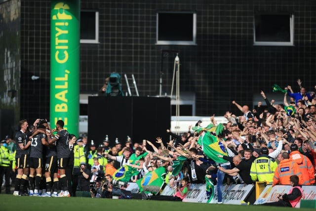 Players and supporters join in the celebrations at a sunny Carrow Road as Bruno’s goal secured all three points.