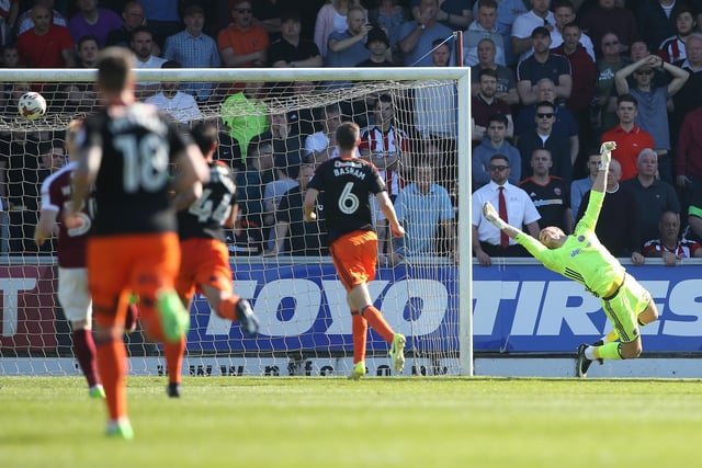 Sheffield United's Simon Moore is beaten for Northampton's opening goal. Pic David Klein/Sportimage