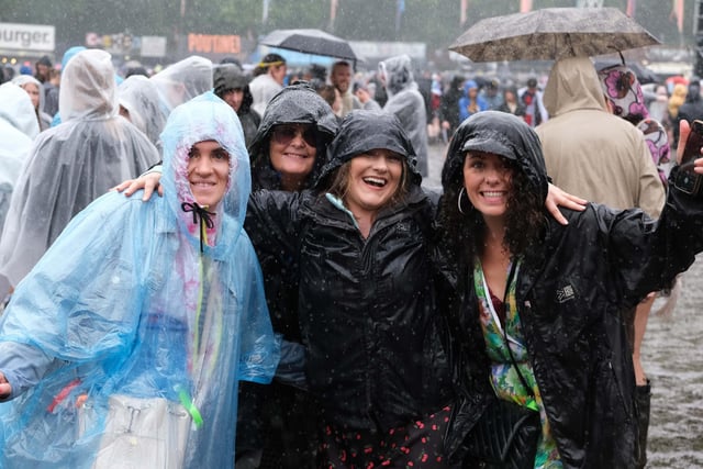 Two days of near-constant rain and tens of thousands of revelers have churned Hillsborough Park up into a mud bath - not that partygoers seem to mind.