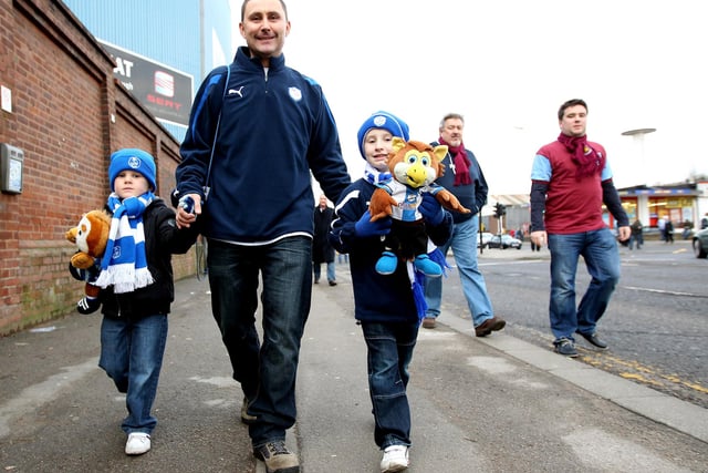 Young Wednesday fans make their way to the ground for the FA Cup third round tie against West Ham United at Hillsborough in January 2012.
