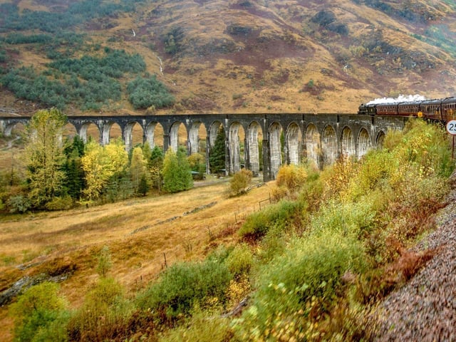 When Harry Potter jumps aboard the Hogwarts Express to take him to Hogwarts School of Witchcraft and Wizardry, the train can be spotted crossing the 21 arches of Glenfinnan Viaduct.