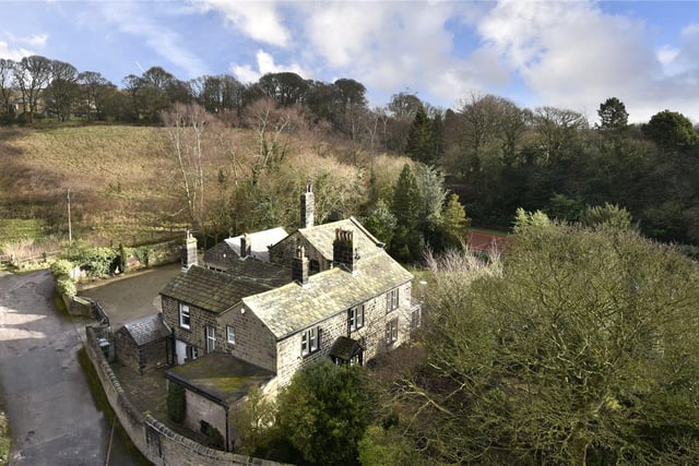 In addition to the gardens, the property boasts a large west-facing paddock complete with a rotating summer house, and magnificent views towards Ilkley Moor.