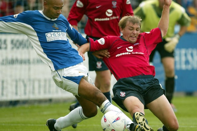 And tussling with York's Richard Cooper while at Macclesfield.