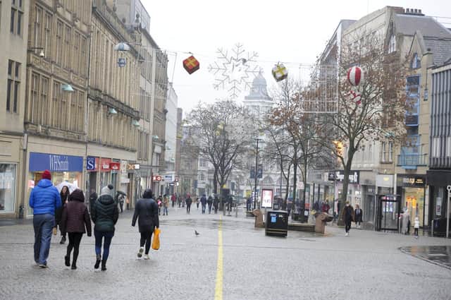 Shoppers on the quiet city centre streets in Sheffield on the last weekend of the second national lockdown before South Yorkshire is placed under Tier 3 Covid-19 rules.