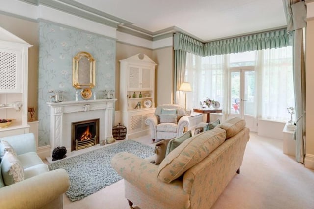 The focal point of the lounge is the log effect gas fire with mahogany mantle, marble surround and hearth.