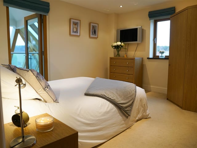 This bedroom has its own access to the balcony and its own en-suite.