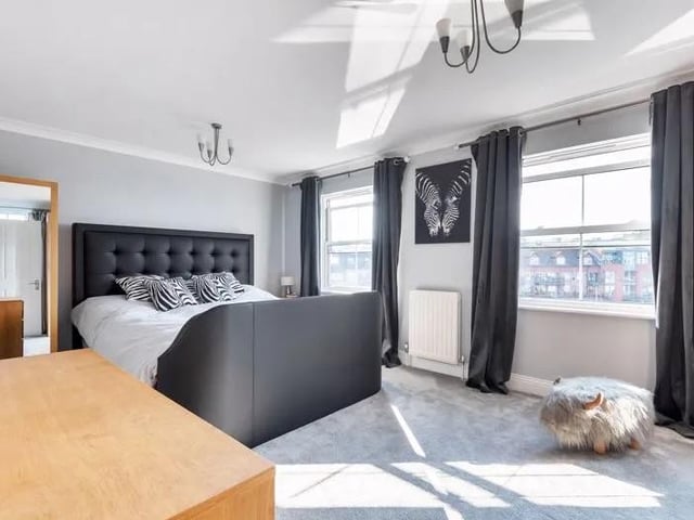 This four bedroom terraced home with views over Camber Dock, Old Portsmouth is on sale for £950,000. Here's what one of the bedrooms looks like.