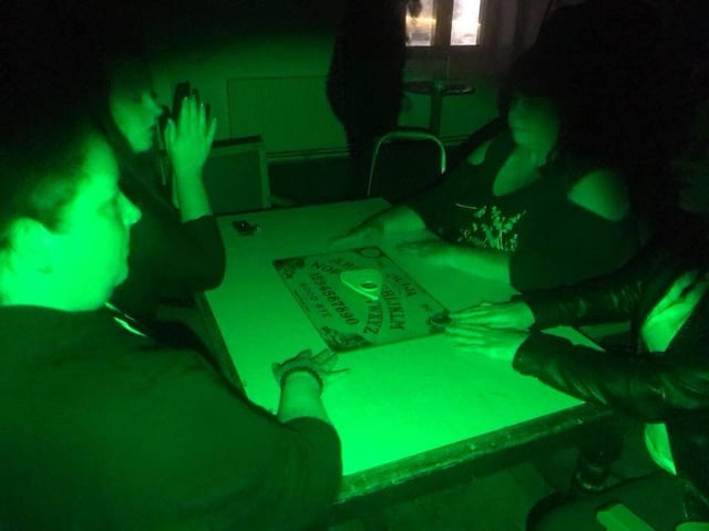 This spooky snap was captured at Thoresby Park in 2019, just before a ghost hunting team took part in an Ouija board session. According to Lee, the area was said to be haunted by a child that had lived in a nearby village.
Also known as a spirit board, the Ouija board is marked with the letters of the alphabet, numbers 0–9, and "yes", "no." It uses a planchette (a small heart-shaped piece of wood or plastic) as a movable indicator to spell out messages during a séance.