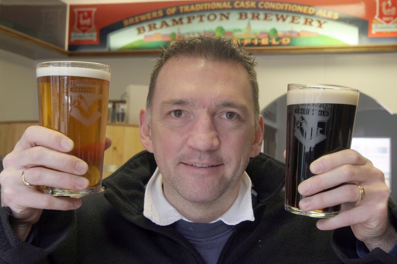 Head brewer Chris Radford with the award-winning mild and bitter beers in 2008.