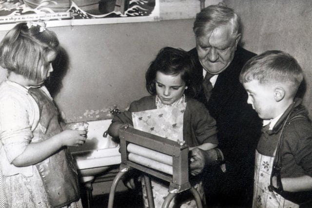 Kitchen crafts are learned by pupils at the Manor Lodge School, City Road, in 1955