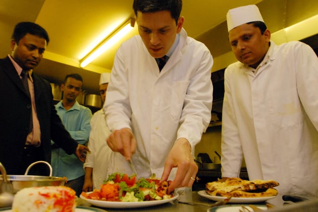 David Miliband had a go at making curry at Cafe India in Ocean Road in 2008. Were you in the picture with him?
