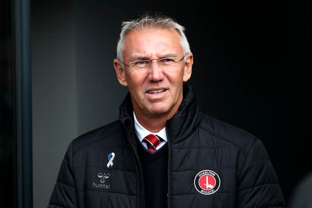 Former Sheffield United boss Nigel Adkins has been dismissed as manager of Charlton Athletic.