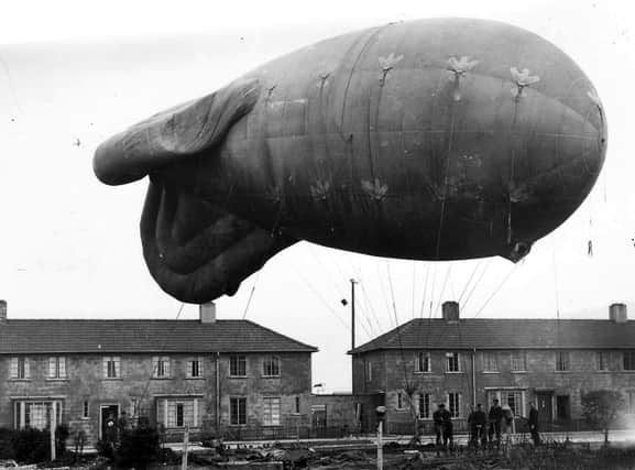 A barrage balloon over Portsmouth, thought to be at Wymering.