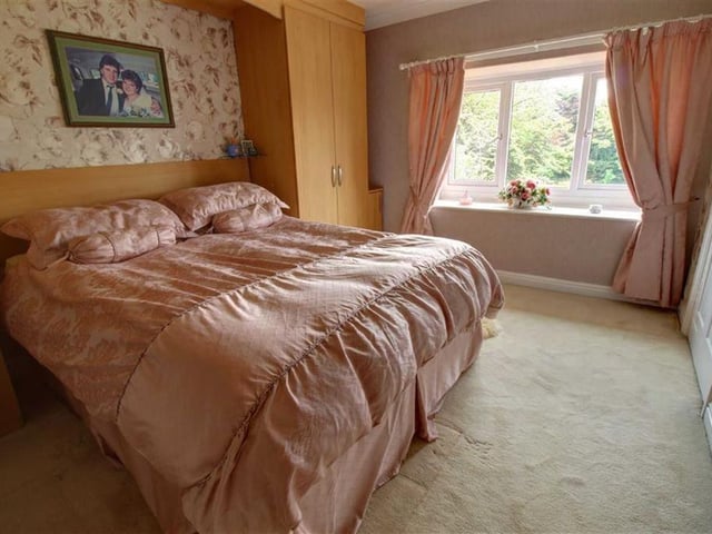 One of the three bedrooms.
