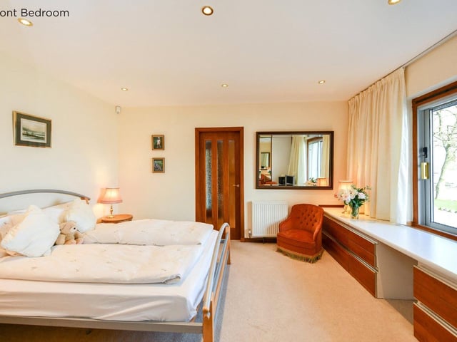 One of the five bedrooms in the house.