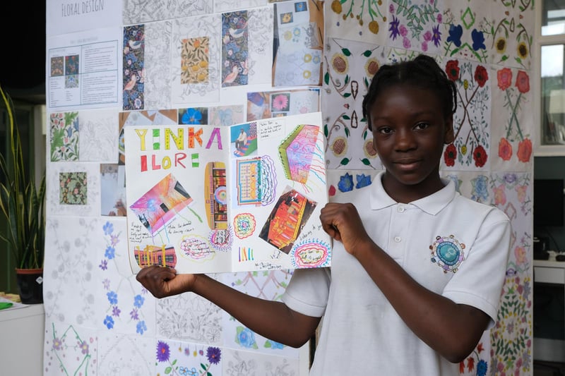 Nether Edge Primary School held its annual art exhibition . Jummy and her work book