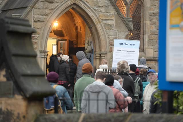 People queuing for their COVID-19 booster jab at Heeley Church