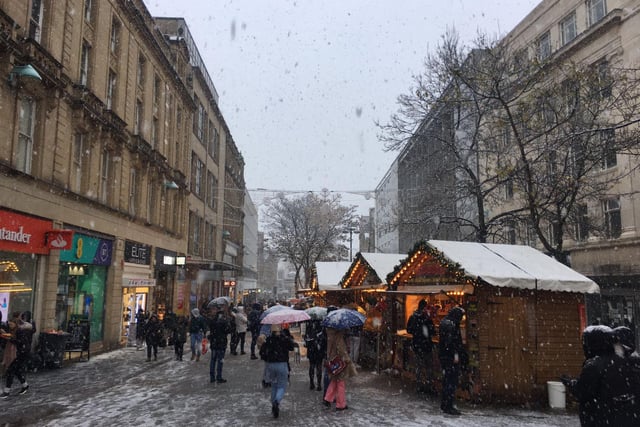 People continue to shop despite the snow