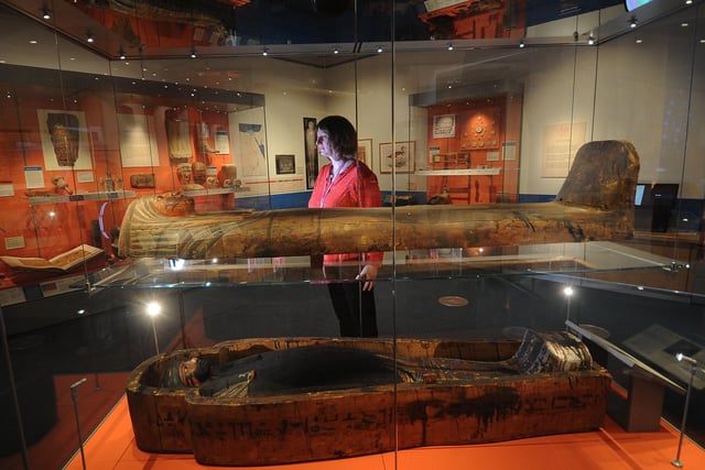 The Egyptian Exhibition at the Weston Park Museum, Sheffield. Curator of Archaeology Martha Jasko-Lawrence is pictured in the exhibition, which includes mummies and other items from ancient Egypt..Picture by Simon Hulme
