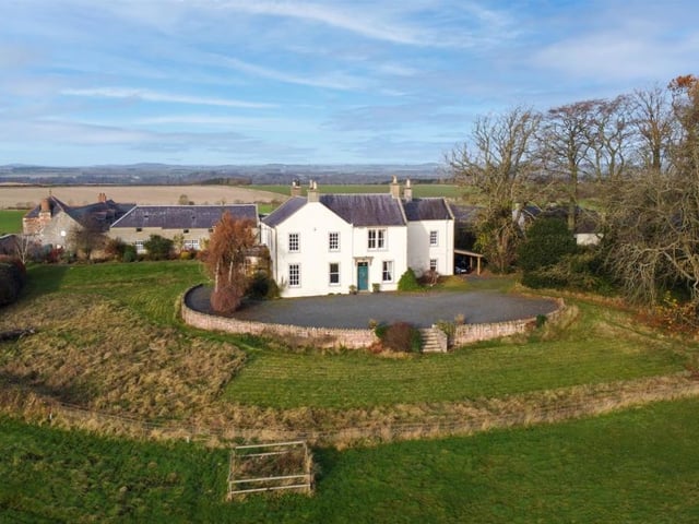 Ladyrig House and outbuildings to rear.