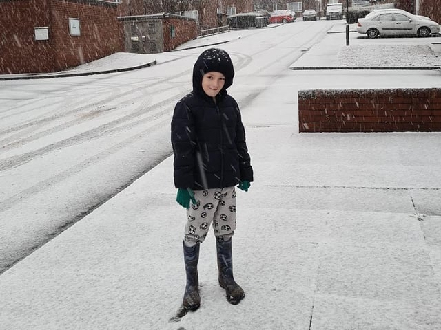 Playing in the snow. Sent in by Terry Hill.