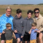 Michael Atwal-Brice with his sons Lance, Lucas, Levi and Lotan, and his husband Paul. Michael, who with Paul has fostered more than 50 children, has been selected to receive the British Citizen Award for his services to the community