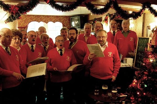 Pictured at the Cock Inn, Oughtibridge, where the Worrall Male Voice Choir was singing Christmas Carols in the bar in 1998