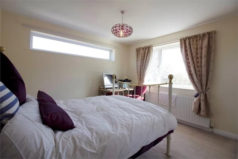 Double-sized bedroom. Ample space for a range of furniture. Rear and side-aspect windows. Fitted carpet flooring.
