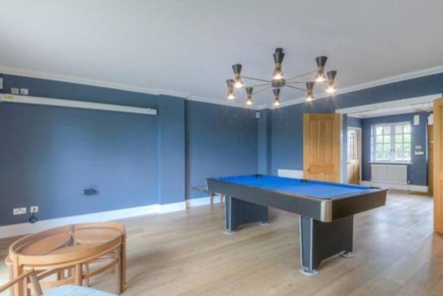 The games room is the perfect place for entertaining guests and comes with a built in media system as well as a pool table and a kitchenette with an integrated fridge to keep your drinks nice and cool as you focus on the game.