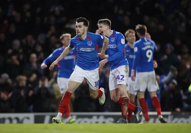 John Marquis celebrates his late winner against Exeter to take Pompey to Wembley. Picture: Joe Pepler