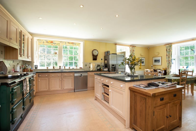 The modern kitchen inside the main farmhouse is a country dream come true.