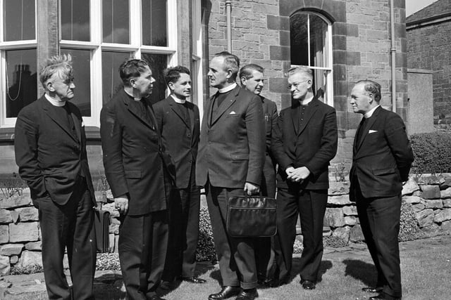 Rev John Gray, the Convener of the Church of Scotland's Nation Committee, talks with Arch Gordon Gray in Morningside's Arch Garden in March 1964.